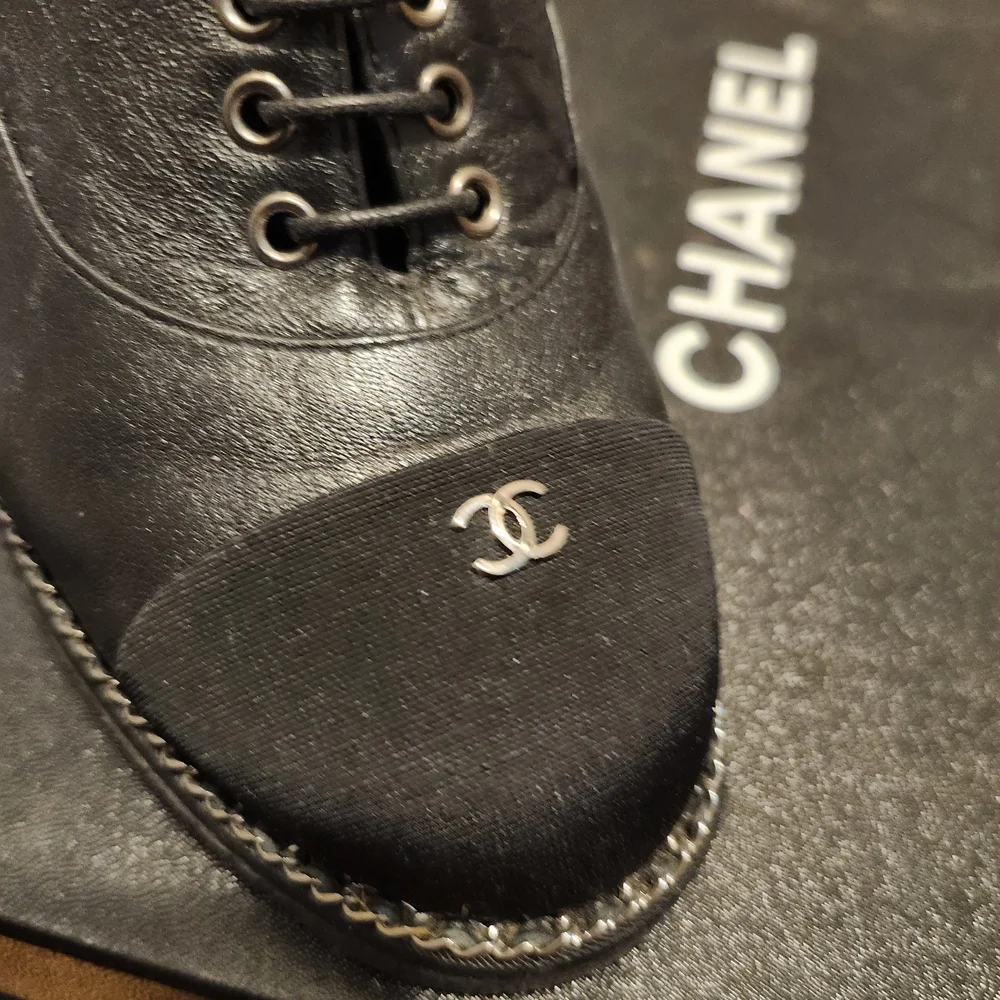 CHANEL Black Leather Lace-Up Platform Heels with Chain Trim - Picture 2 of 5